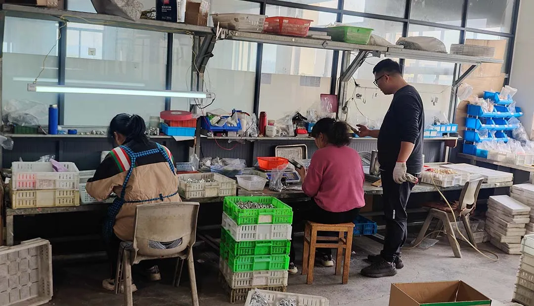 A customer has come to inquire about the progress of product sorting.
