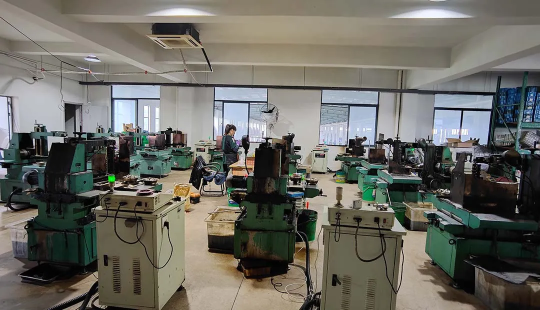 One person is managing multiple wire cutting machines to cut the products.