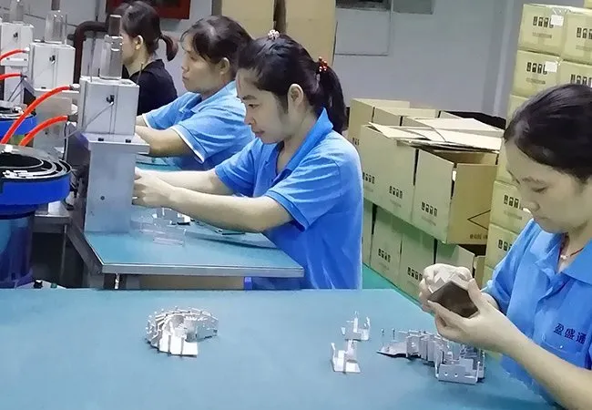Our employees are assembling the parts.